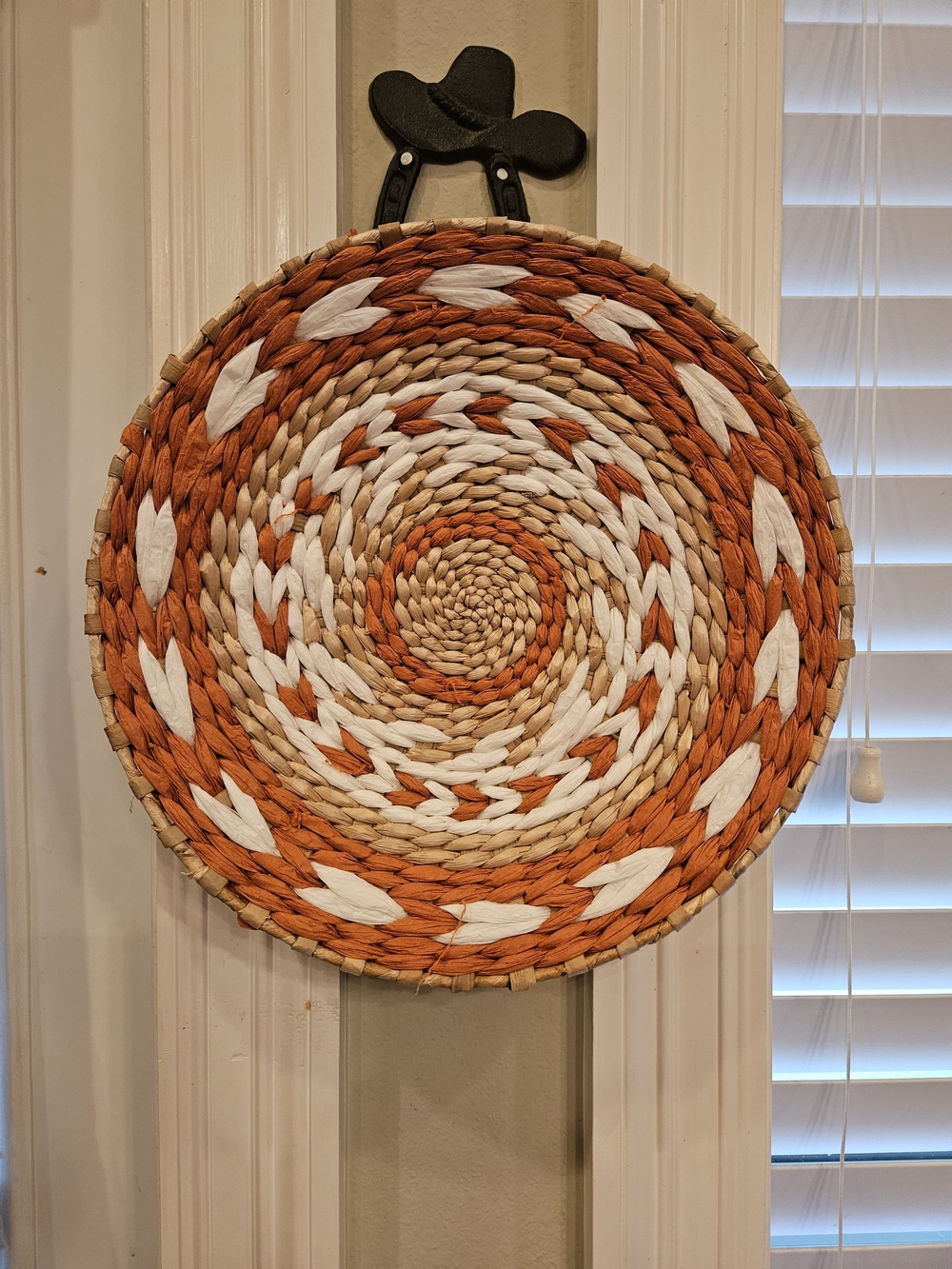 Woven Decorative Wall Basket in Orange, White, and Natural